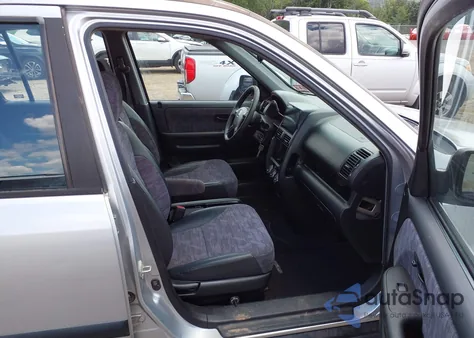 2004 Honda Cr-V Lx z USA, uszkodzony, nr VIN JHLRD684X4C017269